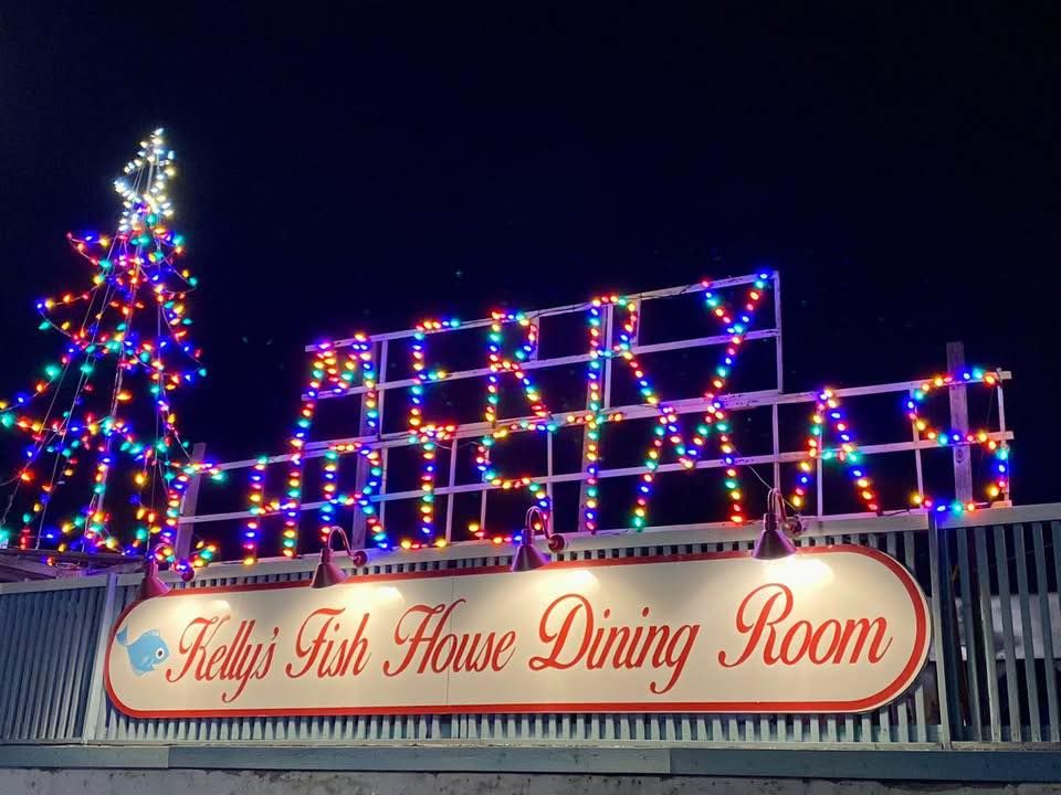 Kelly's sign lit up for the holidays